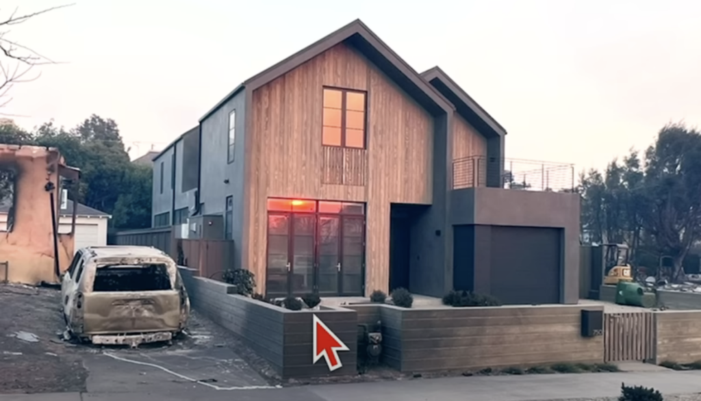 fire resistant home showing concrete wall that protected home from neighbor's car fire